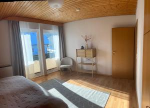 Ένα ή περισσότερα κρεβάτια σε δωμάτιο στο Black Forest Apartments II