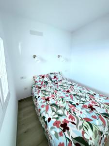 Cama o camas de una habitación en La casa de la playa