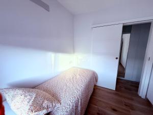 Cama o camas de una habitación en La casa de la playa