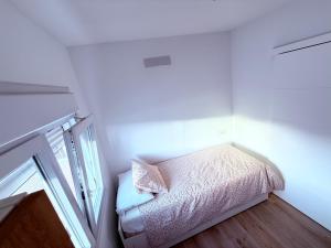 Cama o camas de una habitación en La casa de la playa