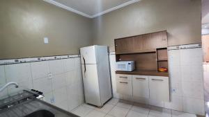 Η κουζίνα ή μικρή κουζίνα στο Casa com Garagem, 3 Quartos e Churrasqueira
