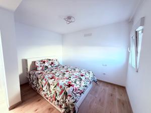 Cama o camas de una habitación en La casa de la playa
