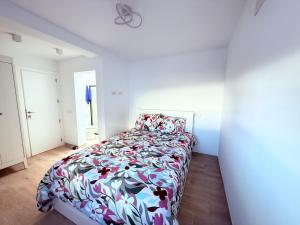 Cama o camas de una habitación en La casa de la playa