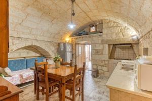 Kuchyň nebo kuchyňský kout v ubytování la liama del sole