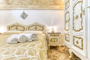 Postel nebo postele na pokoji v ubytování la liama del sole