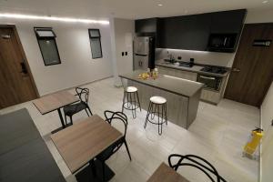 Kuchyň nebo kuchyňský kout v ubytování Casa Indigo Laureles-Estadio con Jacuzzi