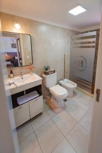 Koupelna v ubytování Río Cuarto Host + 37 fotografií