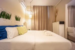 A bed or beds in a room at Zacharitsa APT at Acropolis up 4 guests by LODGESPOT