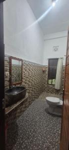 Koupelna v ubytování Sugi Gede Homestay