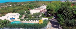 an aerial view of a house with a swimming pool at Pets under the Sun in Alberobello
