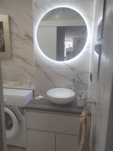 Łazienka w obiekcie Piscina - 1ª línea de playa Puerto Deportivo