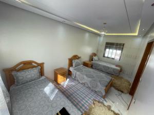 an overhead view of a bedroom with two beds at Casa Karima in Chefchaouene