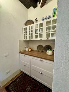 Kuchyň nebo kuchyňský kout v ubytování CasaFraBorgo