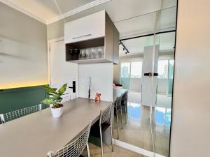 Dapur atau dapur kecil di Sunshine Pôr do Sol Indescritível no Centro de PF