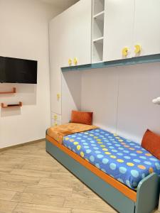 Ένα ή περισσότερα κρεβάτια σε δωμάτιο στο La Casetta di Lulù +42 φωτογραφίες