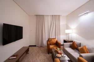 Μια τηλεόραση ή/και κέντρο ψυχαγωγίας στο Landmark Darkm Hotel Makkah