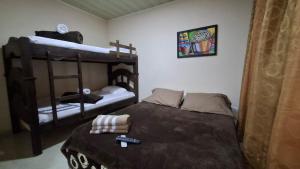 Postel nebo postele na pokoji v ubytování New Paradise Nueva Sede - La Vega Cundinamarca