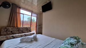 Postel nebo postele na pokoji v ubytování New Paradise Nueva Sede - La Vega Cundinamarca