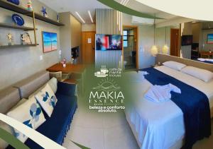 Cama ou camas em um quarto em Makia Beach by Essence - Muro Alto, Porto de Galinhas