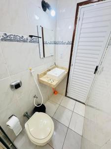 Vannituba majutusasutuses Ap Próx ao Arco com Ar e Garagem