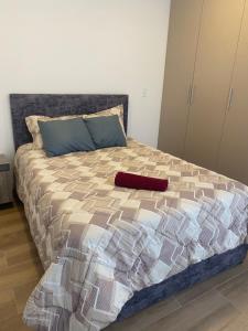 Postel nebo postele na pokoji v ubytování Suit Quito