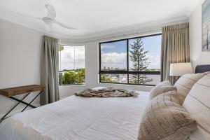 Postel nebo postele na pokoji v ubytování Riverdance Apt. 22 (Penthouse)