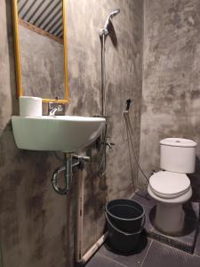 Koupelna v ubytování Bua Guesthouse Tangkahan