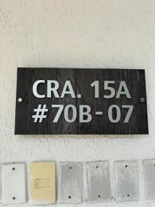 Ein Zertifikat, Auszeichnung, Logo oder anderes Dokument, das in der Unterkunft Deusades Apartamentos ausgestellt ist