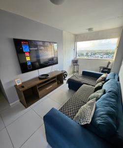 TV a/nebo společenská místnost v ubytování Cobertura Panorâmica 20º andar - Piscina Privativa