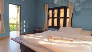 Voodi või voodid majutusasutuse Nature's Way Homestay toas