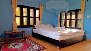 Voodi või voodid majutusasutuse Nature's Way Homestay toas