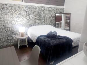 The Nomad Hostel 객실 침대