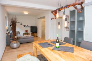 Μια τηλεόραση ή/και κέντρο ψυχαγωγίας στο Ferienhaus am Bellachini +7 φωτογραφίες