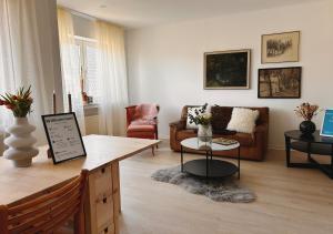 Posezení v ubytování Ferienwohnung Daun + 4 fotografie