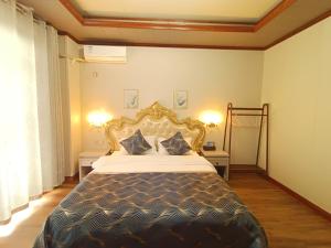 Letto o letti in una camera di Meizhou Cloudy B&B