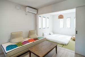 Ένα ή περισσότερα κρεβάτια σε δωμάτιο στο Fuji Holiday C