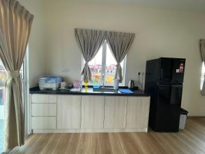 Eldhús eða eldhúskrókur á 幸福轩&幸福一家民宿 Happiness Family Homestay