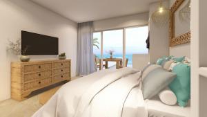 a bedroom with a bed with a tv and a window at So KohKoon Beach Resort in Bang Rak Beach