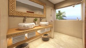 a bathroom with a sink and a mirror at So KohKoon Beach Resort in Bang Rak Beach