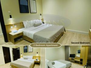 Postel nebo postele na pokoji v ubytování Baithans Hotel - Furnished Apartments