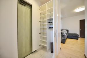 Posezení v ubytování CONDOMINIUM Yomitan 蔵