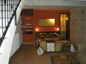 A bed or beds in a room at Ca l'Estruch