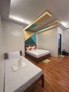 Postel nebo postele na pokoji v ubytování MANANQUIL TRAVEL LODGE + 23 fotografií