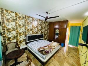 Letto o letti in una camera di New Sahil