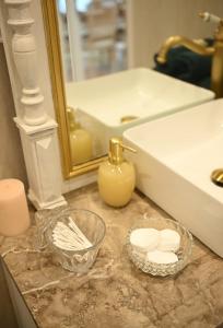 a bathroom counter with a sink and a mirror at Le photo studio in Tremblois-lès-Rocroi +23 photos