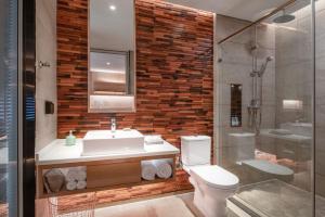 Koupelna v ubytování Yunjian Hotel + 24 fotografií