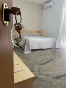 A bed or beds in a room at B&B Villa Marinetti