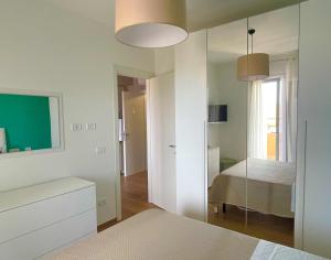Postel nebo postele na pokoji v ubytování B&B e Apartment MARIA VITTORIA - Anzio Blue Horizon - 150 mt dal mare