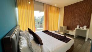 Una cama o camas en una habitación de Aura safari