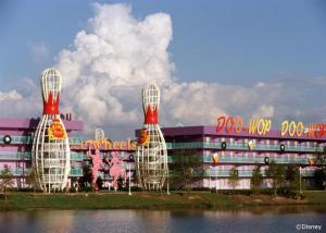 a large building with a building with a sign that reads hot wheels at Disney's Pop Century Resort in Orlando